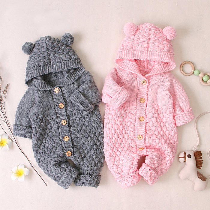 Modelli primaverili e autunnali della tuta lavorata a maglia dei vestiti del bambino